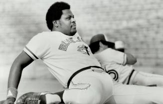 Stretch: Big John Mayberry joins his teammates in a stretch that has no relation to the seventh inning