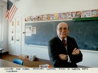 Concord High school principal Charles Foley in Christa empty classroom