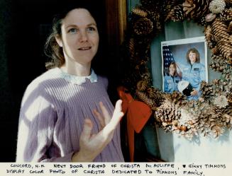 Concord High School next door friend of Christa McAuliffe, Ginny Timmons display color photo of Christa dedicated to Timmons family