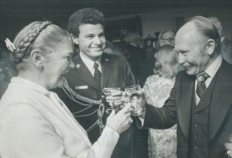7 P.M. At a cocktail party in Toronto, Pauline McGibbon joins Israeli Consul General Shmuel Ovnat, right, and Lt. D. A. Rubin, in a toast to 28th anni(...)