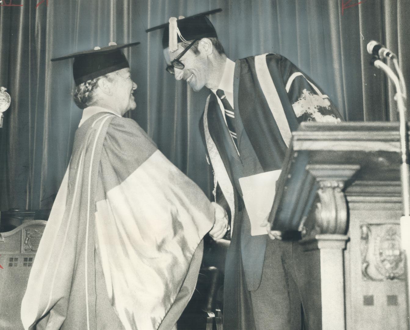 Awarded an honorary law degree Lieutenant-Governor Pauline McGibbon is congratulated by U of T President John Evans
