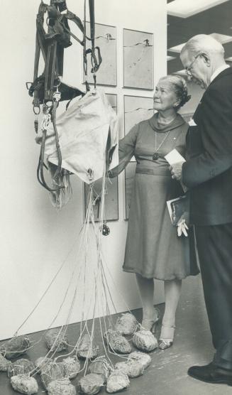A gift fit for a queen? Lieutenant-Governor Pauline McGibbon and husband, Donald, look slightly puzzled by The Heavier Than Air Falling Machine, a com(...)