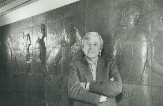 I'm ignored by Canadian critics,' says sculpto Bill McElcheran, who is standing in front of terra cotta panel he designed in the Atrium on Bay, leadin(...)