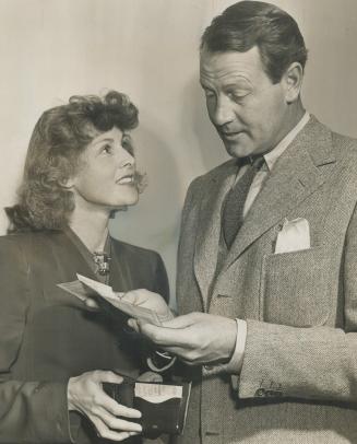 Mr. and Mrs. Joel McCrea. That was Buffalo Bill and his ever-lovin wife who passed through Toronto's rain this morning, pdner - Buffalo Bill, without (...)