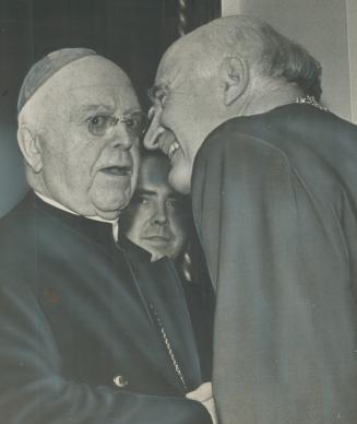 Your grace,' 'Your eminenece'. James Cardinal McGuigan, Archbishop of Toronto, left, and Michael Ramsey, Archbishop of Canterbury and Primate of All E(...)