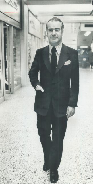 Strolling through Toronto mall, Alisdair McKichan, president of $16 bilion-a-year Retail Council of Canada, checks out his territory