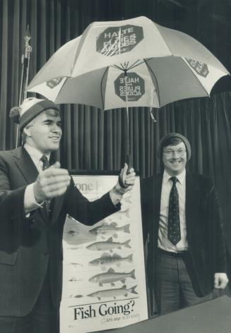 Federal Environment Minister Tom McMillan (left) and his Ontario counterpart, Jim Bradley, ham it up today at Queen's Park after signing an acid rain (...)