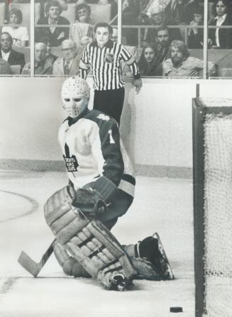 Say it isn't so. Maple Leaf goalie Gord McRae looks ruefully at puck which has rebounded from rigging after Pittsburgh Penguins' second goal of Nation(...)