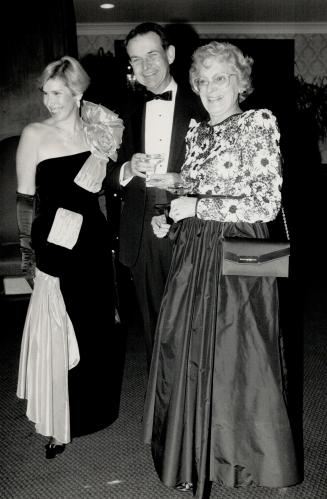 Above, Anne Funnell, at left, Toronto Symphony president Geoffrey Mckenzie, and his wife Marge