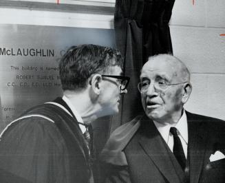 R. S. McLaughlin Honored. Dr. George Tatham, master of McLaughlin College at York University, talks with Co. R. S. McLaughlin, whom the college is nam(...)