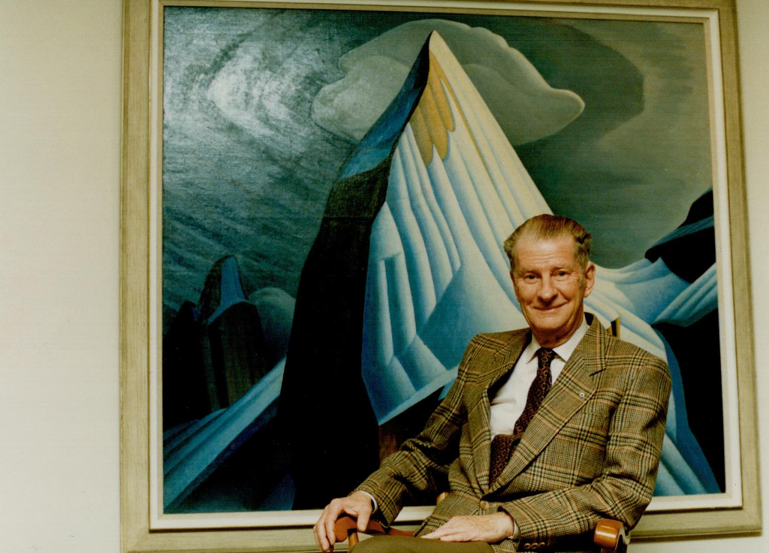 He started it all: Robert McMichael poses with Lawren Harris' classic 1930 canvas, Mount Lefroy, at gallery in Kleinburg that's celebrating its 25th anniversary