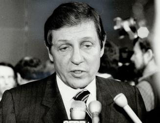 Key players: Former Saskatchewan attorney-general Roy Romanow, left, and counterpart Roy McMurtry of Ontario met with Chretien during so-called kitchen cabinet talks in 1981