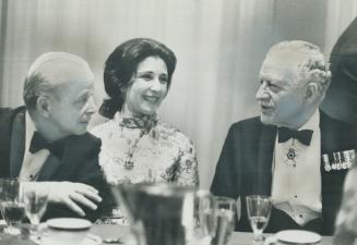 Governor-general Roland Michener (right) talks with Mrs