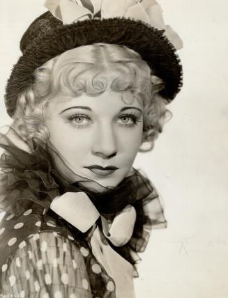 Charming Una Merkel, as she appears in The Night Is Young, Metro-Goldwyn-Mayer's new production co-starring for the first time, Ramon Novarro and Evelyn Laye