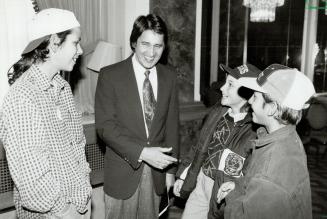 Ovide Mercredl, national chief of the Assembly of first Nations, greets Heeshenn Roy, 11, and Yoti McKay, 10, of Toronto's First Nations School before(...)