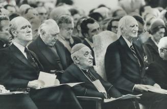 Controversial former primate of Hungary, Cardinal Josef Mindszenty, 82, was flanked by External Affairs Minister Mitchell Sharp, left, and the then li(...)