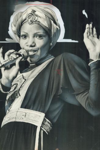 A powerful voice ina tiny frame, that's Melba Moore, who last night opened for two weeks at the Royal York Hotel's Imperial Room. Star staff writer Fr(...)