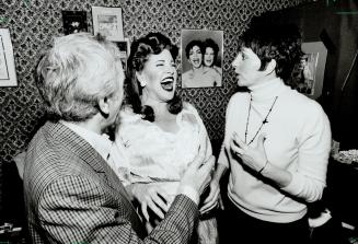 Dolls and a guy. Two famous stage sisters talk it up yesterday as Liza Minnelli, joined by her O'Keefe Centre co-star Charles Aznavour, visits her sis(...)