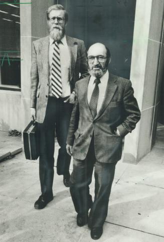 Out of court: Dr. Henry Morgentaler and Dr. Robert Scott leave the Supreme Court of Ontario yesterday where charges against Scot and Dr. Leslie Smoling were dropped