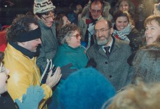 Victory smile: A beaming Dr. Henry Morgentaler is surrounded by equally pleased supporters outside his Harbord St. clinic yesterday after a Supreme co(...)