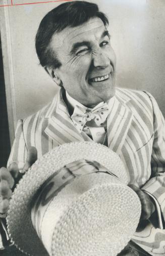 In the strenuous lead role of Travesties, Barry Morse alternately sheds and regains 60 years in a six-second costume change. He plays the doddering, g(...)