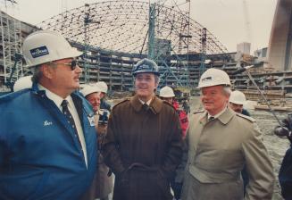 A site to behold, Prime Minister Brian Mulroney, centre, was given a close-up look at the progress of work on the SkyDome during a visit to Metro yest(...)