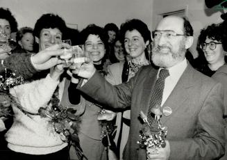 Pause for celebration: Dr. Henry Morgentaler and supporters share a champagne toast yesterday at his Harbord St. abortion clinic to mark its second an(...)