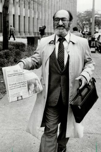 Dr. Henry Morgentaler, on trial for conspiracy to procure a miscarriage at a Harbord St. clinic, is seen entering University Avenue courthouse today. (...)