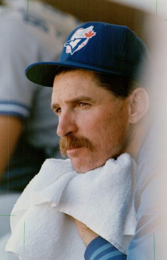 Rocked early in game 4, Jack Morris watches from the bench as the Jays stage their big comeback