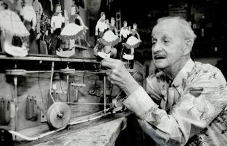 Alex Mulligan tinkers with machinery that sets in motion his hand-made collection of stubble-jumpers as he has dubbed them