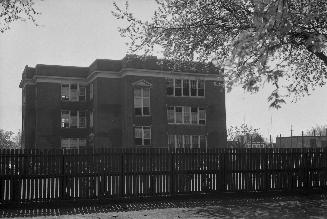 Essex St. Public School, Essex St., north side, between Christie & Shaw Streets, looking south from Garnet Avenue, Toronto, Ontario