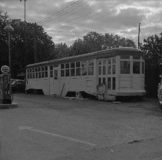 T.T.C., #2962, in use as office for Lawrence Motors Limited, Yonge Street, east side, north of …