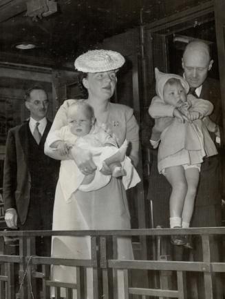 Princess Juliana of Holland has found a haven in Canada for herself and her two daughters, Beatrix, 2 1/2, and Irene nine months. Here they are leaving Halifax for the Seigniory Club