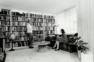 Heart of apartment, Small library, above, opens on to living room of mid-town apartment shared by journalists Knowlton Nash and Lorraine Thomson