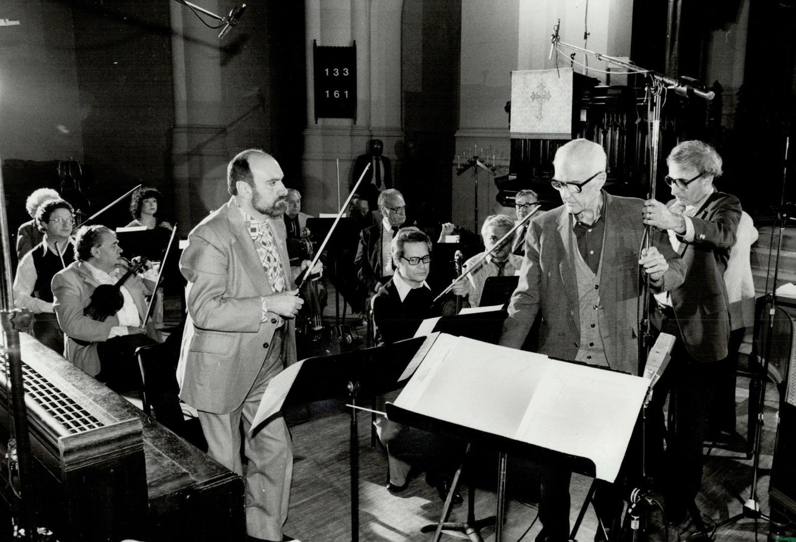 Recording session, That's Dr. Boyd Neel, renowned baroque maestro, centre, during one of the recording sessions for his new album The Pachelbel Canon (...)