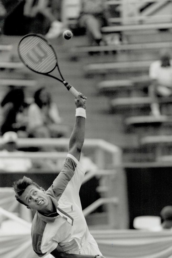 The big boom, Toronto's Daniel Nestor uses his powerful serve yesterday to defeat Italy's Cristiano Caratti in two sets at the Player's International tournament