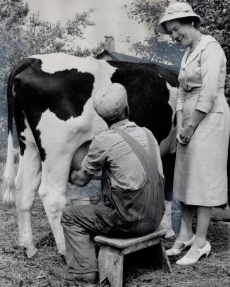 Seeing for herself is Con. Jean Newman, making study of what is involved in milk inspection. Yesterday, Mrs. Newman said the $46,000 annual job will b(...)