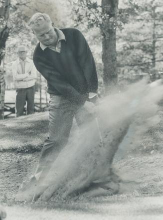 Jack Nicklaus blasts out of sand at St