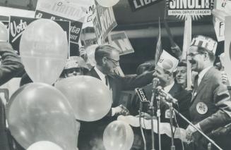 Balloons and hoopla highlighted last night's massive Liberal rally at the CNE Coliseum as Liberal leader Robert Nixon greeted Metro area Liberal candi(...)