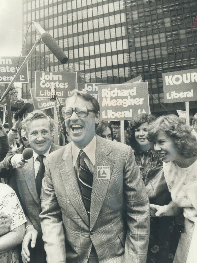 A Jovial Robert Nixon makes his way among supporters at the Toronto-Dominion Centre to address a rally yesterday, along with Metro area Liberal candid(...)