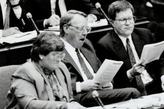 Moment of truth, Opposition Liberals-former health minister Elinor Caplan, interim leader Bob Nixon, centre, and former education minister Sean Conway - listen while the NDP reveals its budget