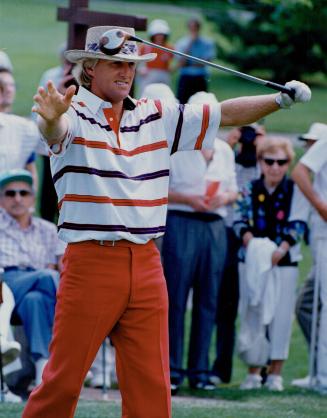 The threat from down under. Look out, Glen Abbey, Here comes the Great White Shark. Australian ace Greg Norman one of golf's more animated players, cl(...)