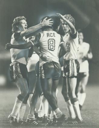 He socks it to 'em, Ace Ntsoelengoe of Blizzard is mobbed by happy teammates after scoring the goal that put the Toronto team into the North American (...)