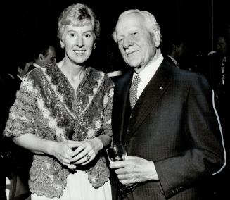 Run for 1985, Dr. Maureen O'Bryan talks over plans for the Masters Games, to be held in Toronto in August 1985, with Canada's most famous jogger, former Governor-General Roland Michener