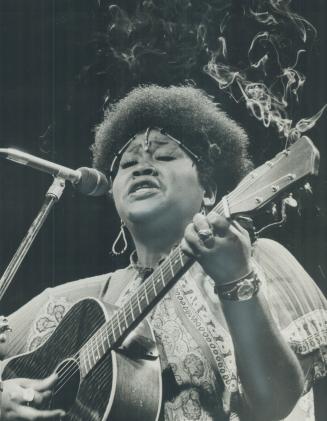 Incense burned on Odetta's guitar last night when the folksinger entertained happy, relaxed fans as the three-day Mariposa Festival opened its 10th se(...)