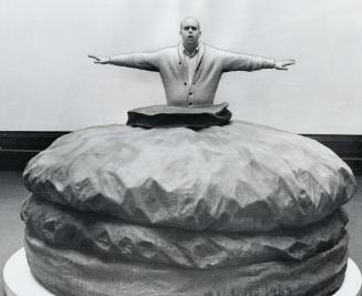 High-priced Hamburg. Art Gallery of Ontario is on verge of buying Giant Hamburger, 1962, shown here with its creator, Claes Oldenburg, for a reported (...)