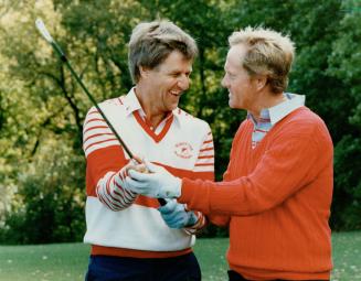 Bobby Orr (l) with Jack Nicklaus
