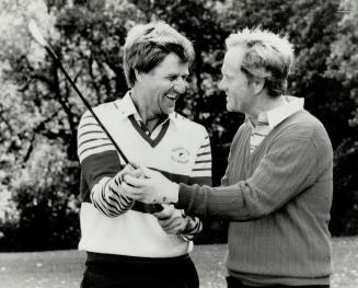 You hold this end . . . Golfing great Jack Nicklaus gives hockey great Bobby Orr some tips at the Bobby Orr Invitational golf tournament at Emerald Hi(...)