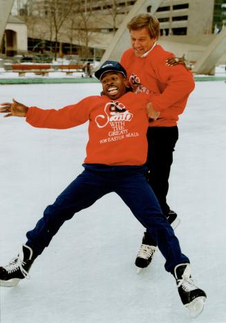 Hey, what's this stuff? Argo Mike (Pinball) Clemons takes to the ice with Bobby Orr yesterday to promote Orr's Easter Seal skateathon Sunday. Although(...)