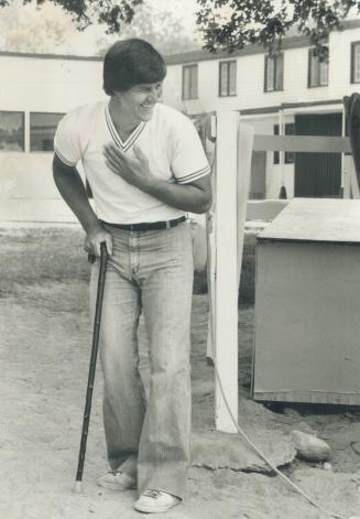 No joke, really, Bobby Orr manages a grin as he limps around hockey camp
